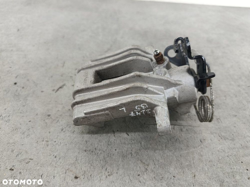 ZACISK HAMULCOWY LEWY TYŁ VW PASSAT B5 FL 1.9 TDI - 4