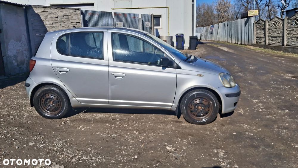 Na części Toyota Yaris I LIFT silnik 1.0 1SZ-FE , 1.3 VVY-i 2SZ-FE lakier 1E7 skrzynia maska zderzak drzwi klapa szyba fotel kanapa lusterko lampa - 5