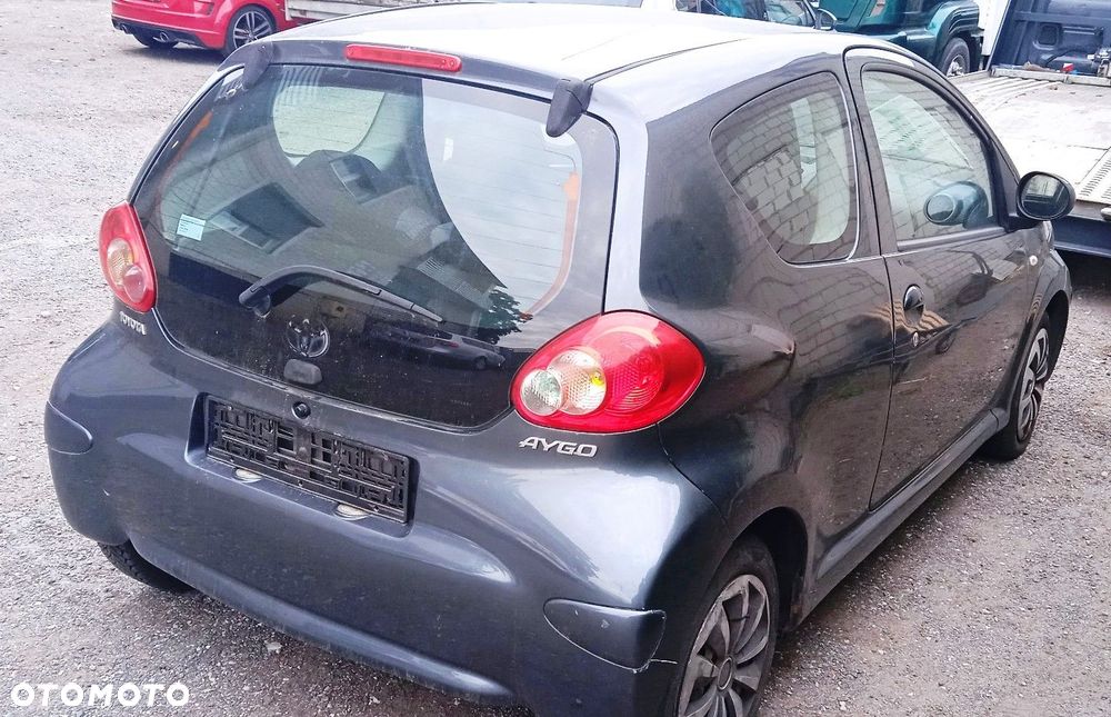 Na części Toyota Aygo lak. 1E0 silnik skrzynia maska zderzak drzwi klapa szyba fotel kanapa lusterko - 3