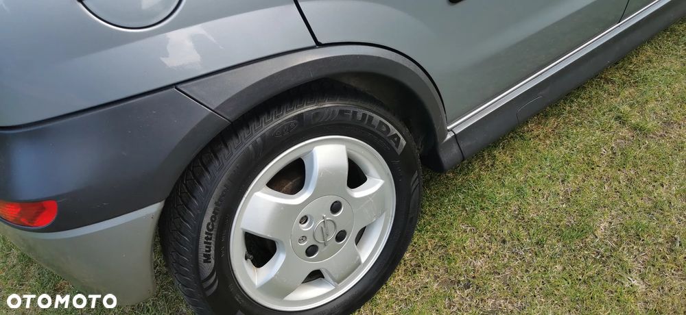 Opel Corsa 1.2 16V Enjoy - 12