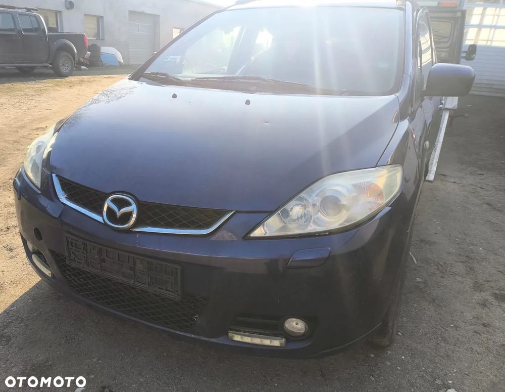 Na części Mazda 5 silnik skrzynia biegów drzwi maska klapa zderzak szyba czołowa karoseryjna fotel kanapa lampa lusterko błotnik - 1