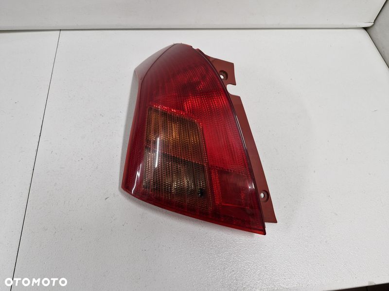SUZUKI SWIFT MK6 LAMPA LEWY TYŁ LEWA TYLNA - 1