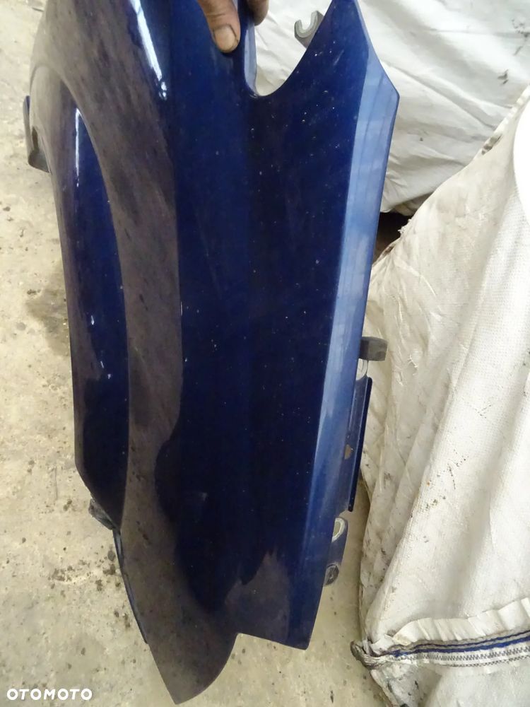 Błotnik Opel Meriva A prawy przód granatowy - 4