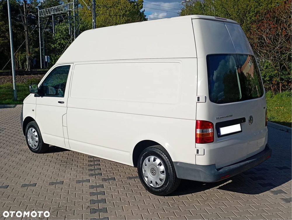 Volkswagen TRANSPORTER T5 XI.2009r. MAX WYSOKI 1,9 TDI 102KM KLIMATYZACJA NOWE SPRZĘGŁO I ROZRZĄD PRZEGLĄD NA ROK ZERO RDZY 3 OSOBOWY STAN TECHNICZNY WZOROWY ŁADOWNOŚĆ 1385 KG BEZWYPADKOWY VAT1 ELEKTR. SZYBY I LUSTERKA - 34