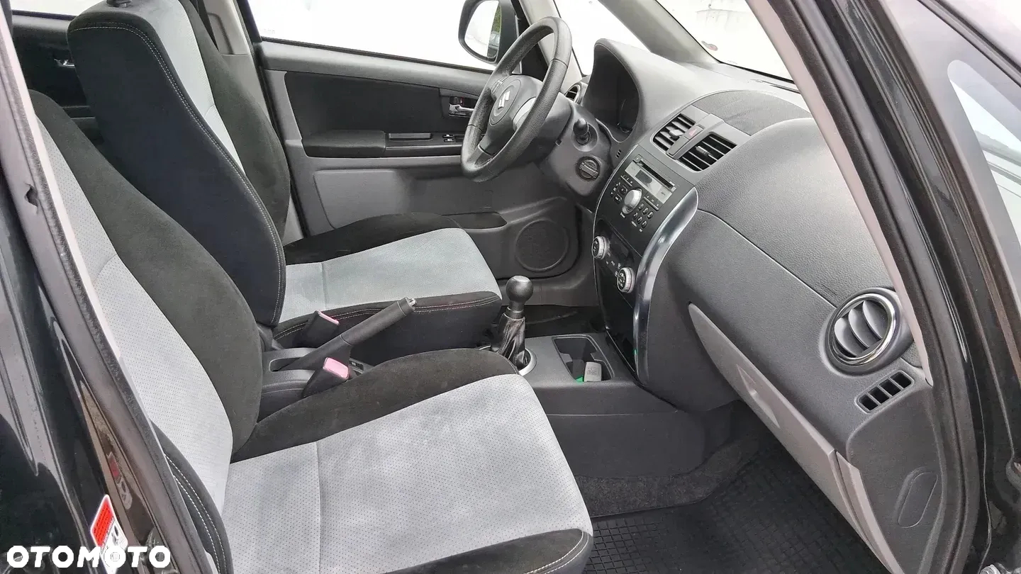 Suzuki SX4 1.6 Comfort Plus - 11
