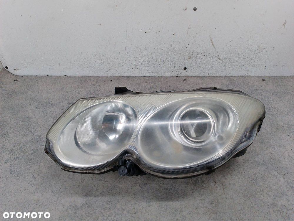 LAMPA PRZÓD LEWA CHRYSLER 300M 04780003AC - 1