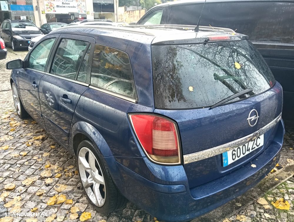 Opel Astra Caravan 1.9 CDTi Cosmo - 9