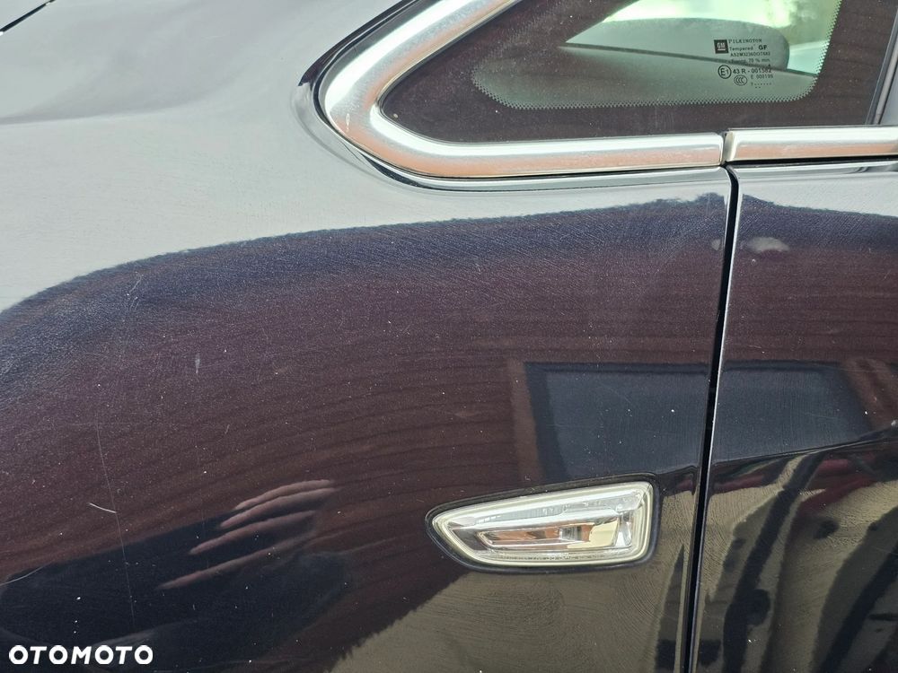 BŁOTNIK LEWY PRZÓD PRZEDNI OPEL ASTRA J Z20R - 4