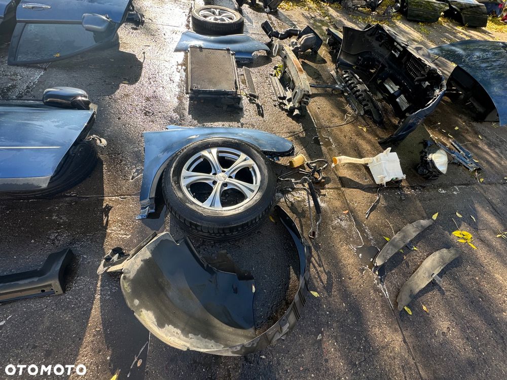 Subaru tribeca b9 maska osłona pod silnik lampy przód filtr obudowa filtra zderzak przód wzmocnienie górne pas belka przód chłodnica oleju chłodnica klimy zbiorniczek spryskiwaczy zawiasy maski błotnik prawy lewy węże wspomagania drzwi prawe lewe przednie tylne progi felgi koła klapa tył lampy tył belka tył zderzak tył - 5