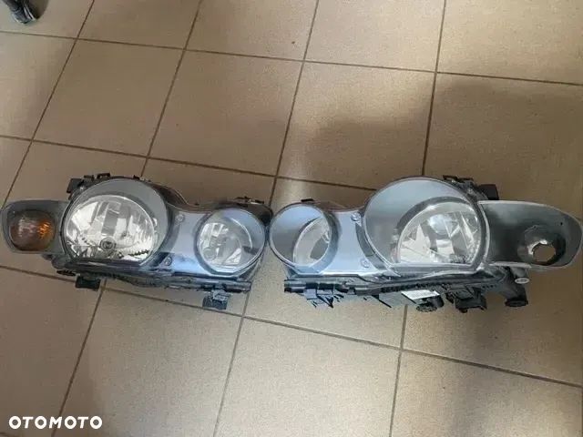 REFLEKTOR LAMPA LEWA 0301187201 PRAWA 0301187202 PRZÓD BMW E46 COMPACT