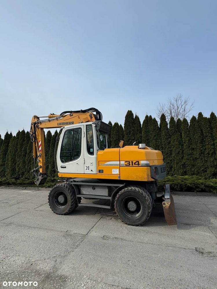 Liebherr 314 Litronic Rotator - 3