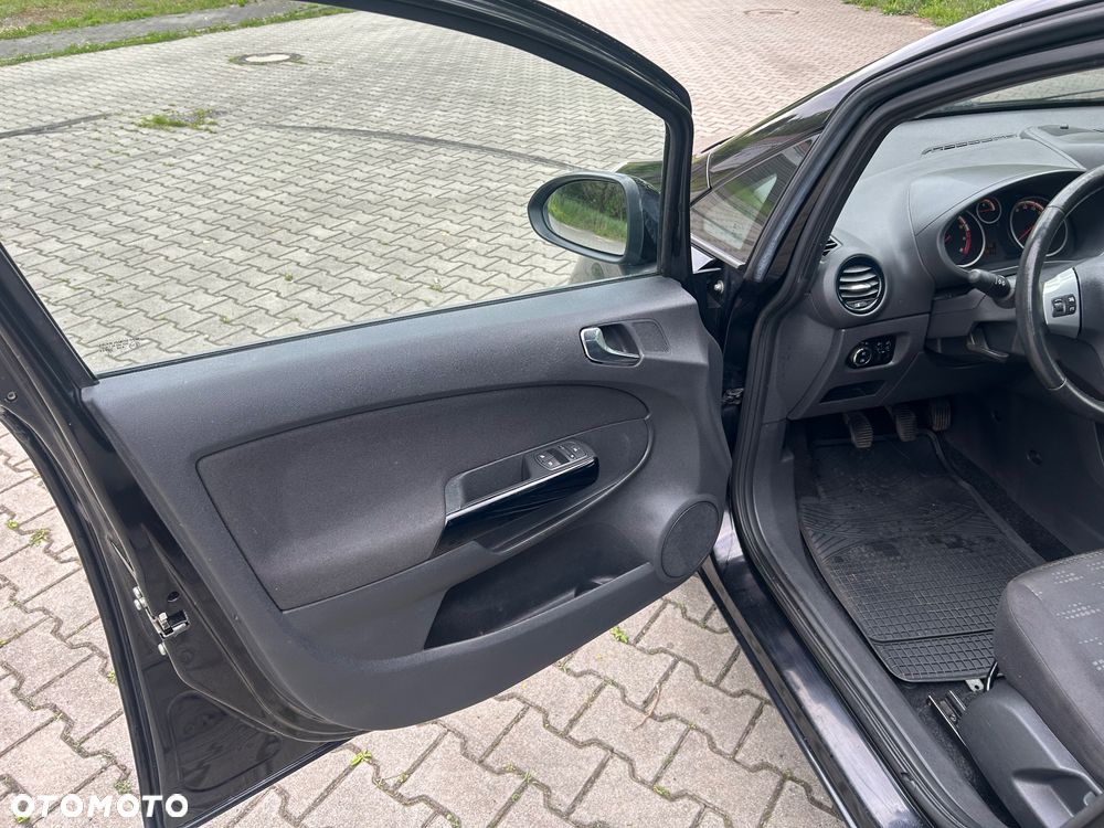 Opel Corsa 1.2 16V Enjoy - 11