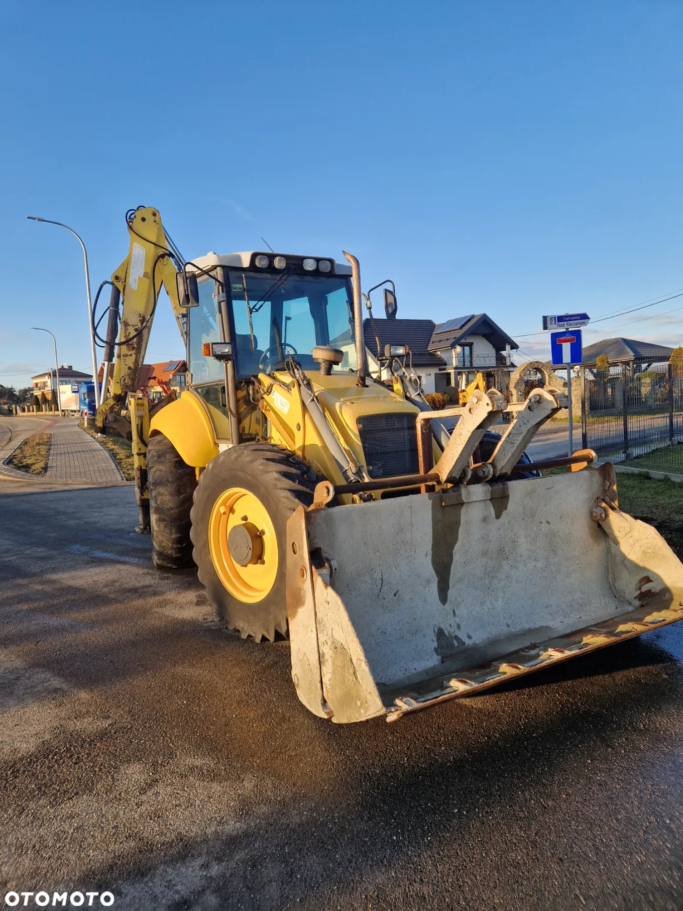 New Holland LB115 - 4