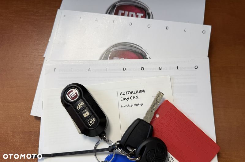 Fiat DOBLO VAN VAT-1 Homologacja cięż. DMC: 2145kg Ładowność 706kg MOCNY SILNIK 1.6 MultiJet, 105KM Emisja Euro-6, Skrzynia biegów 6-cio stopniowa! ORYGINALNA ZABUDOWA PAKI, BOCZNE DRZWI PRZESUWNE, RADIO FABRYCZNE, Hak 1300kg, PODGRZEWANE FOTELE Z REG. I PODŁOKIETNIKIEM, BAGAŻNIK DACHOWY ORYGINALNY FIAT, PARKTRONIKI, ALARM.. - 16