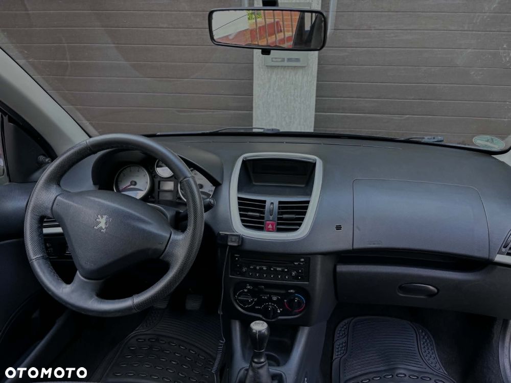 Peugeot 206 plus 75 - 23