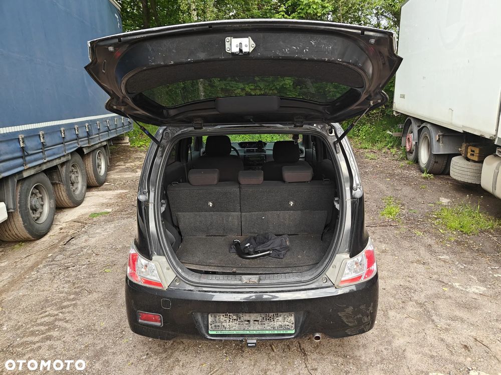 Daihatsu Materia 1.5 - 12