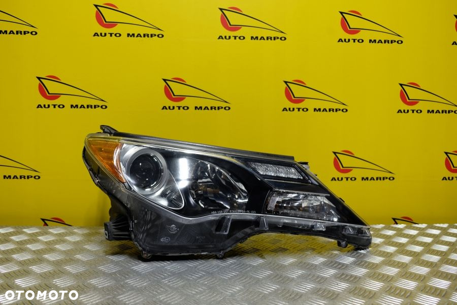 TOYOTA RAV4 2013- REFLEKTOR LAMPA PRAWA ZWYKŁA SOCZEWKOWA USA - 2