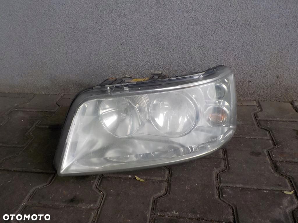VW T5 CARAVELLE 7H1941015L LAMPA LEWA PRZÓD PRZEDNIA REFLEKTOR LEWY - 1
