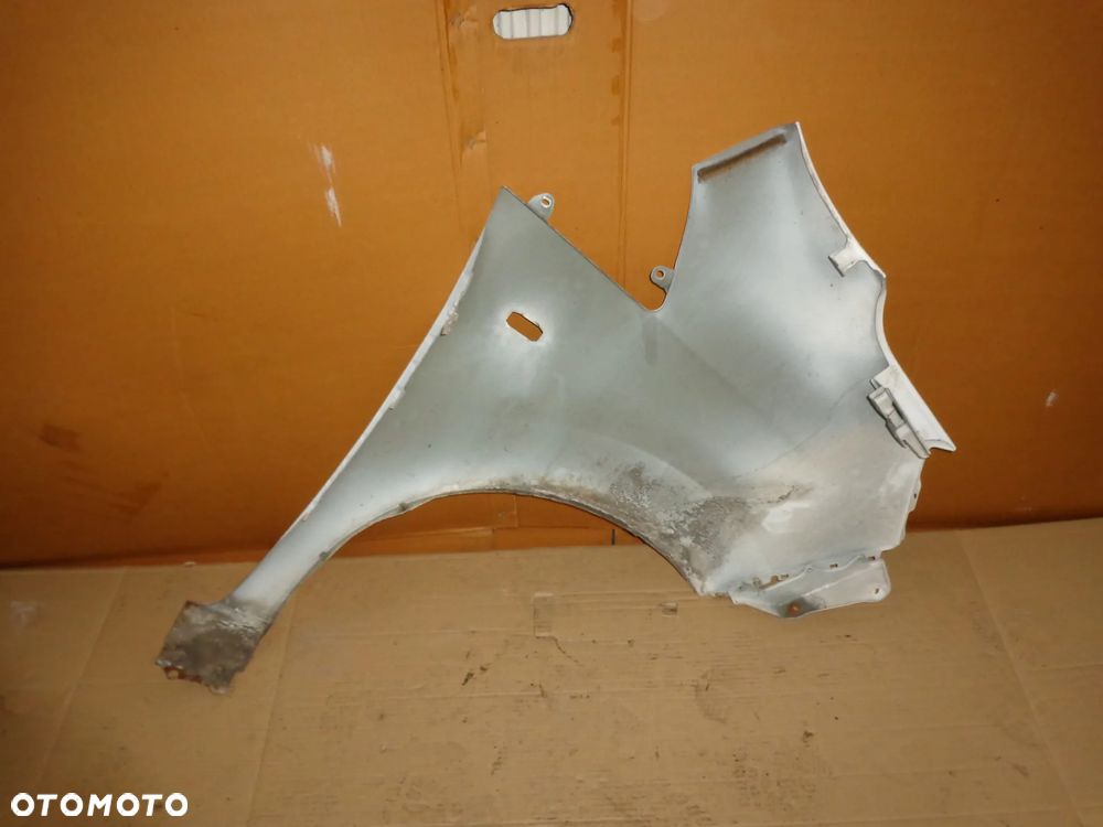 NISSAN NV200 blotnik lewy przedni lak QM1 - 2