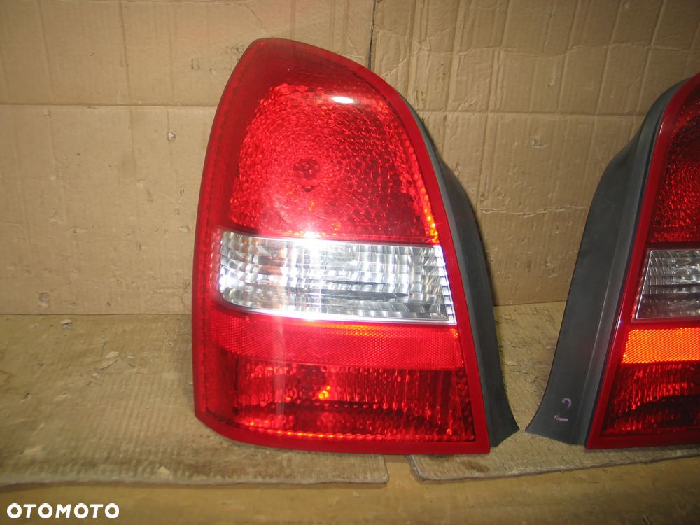 lampa tyl prawa lewa nissan primera P12 sedan oryginal - 2