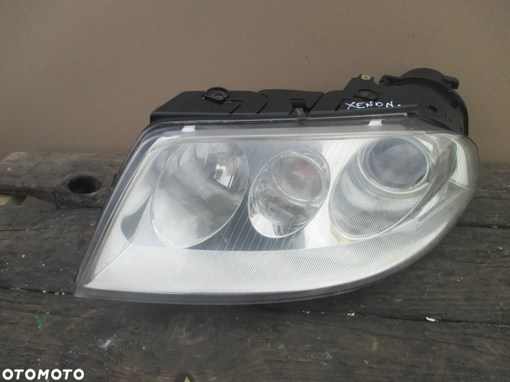 lampa lewa VW Passat B5 lift Xenon Hella Europa - 1
