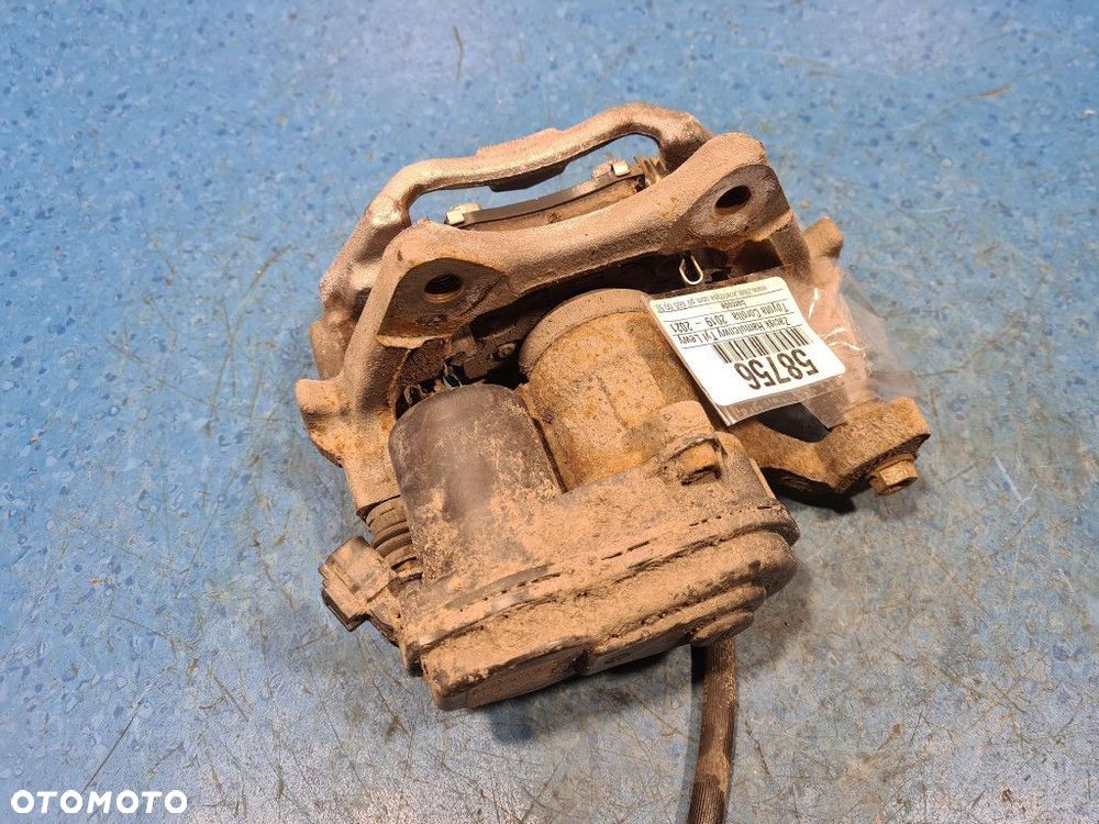 TOYOTA COROLLA E21 ZACISK HAMULCOWY TYŁ LEWY - 7