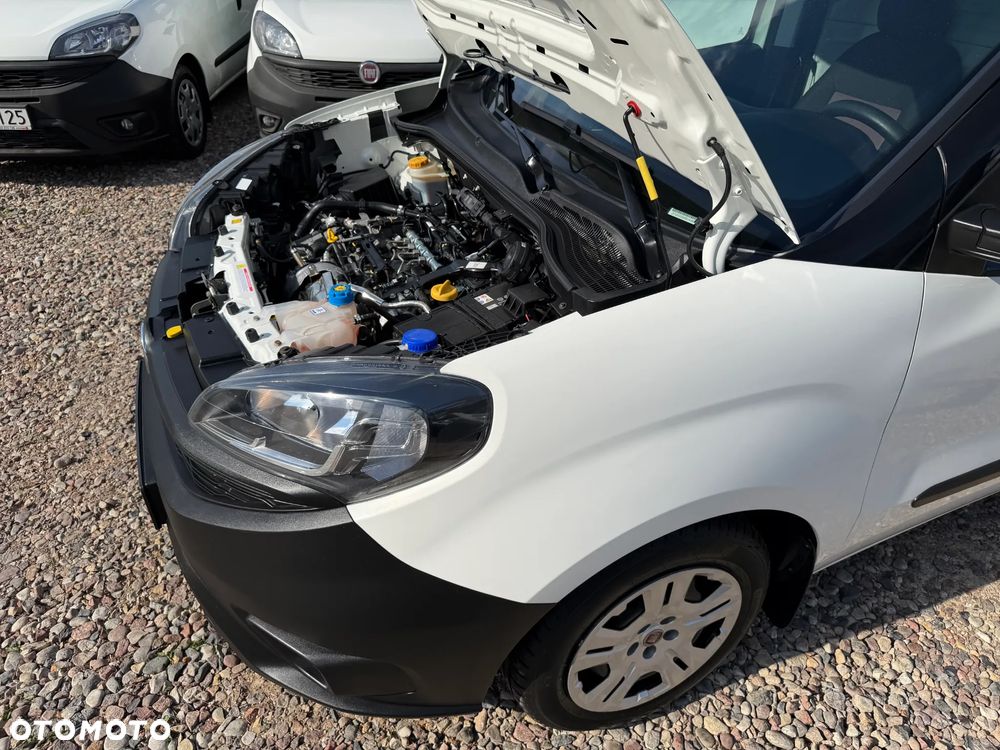 Fiat DOBLO VAN VAT-1 Homologacja cięż. DMC: 2145kg Ładowność 706kg MOCNY SILNIK 1.6 MultiJet, 105KM Emisja Euro-6, Skrzynia biegów 6-cio stopniowa! ORYGINALNA ZABUDOWA PAKI, BOCZNE DRZWI PRZESUWNE, RADIO FABRYCZNE, Hak 1300kg, PODGRZEWANE FOTELE Z REG. I PODŁOKIETNIKIEM, BAGAŻNIK DACHOWY ORYGINALNY FIAT, PARKTRONIKI, ALARM.. - 32