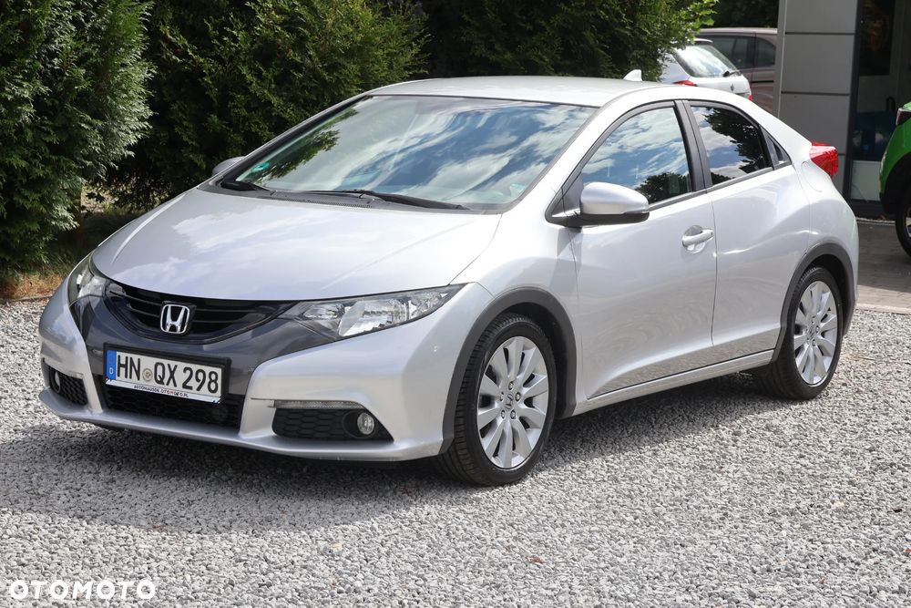 Honda Civic 1.4 i-VTEC Elegance - 1