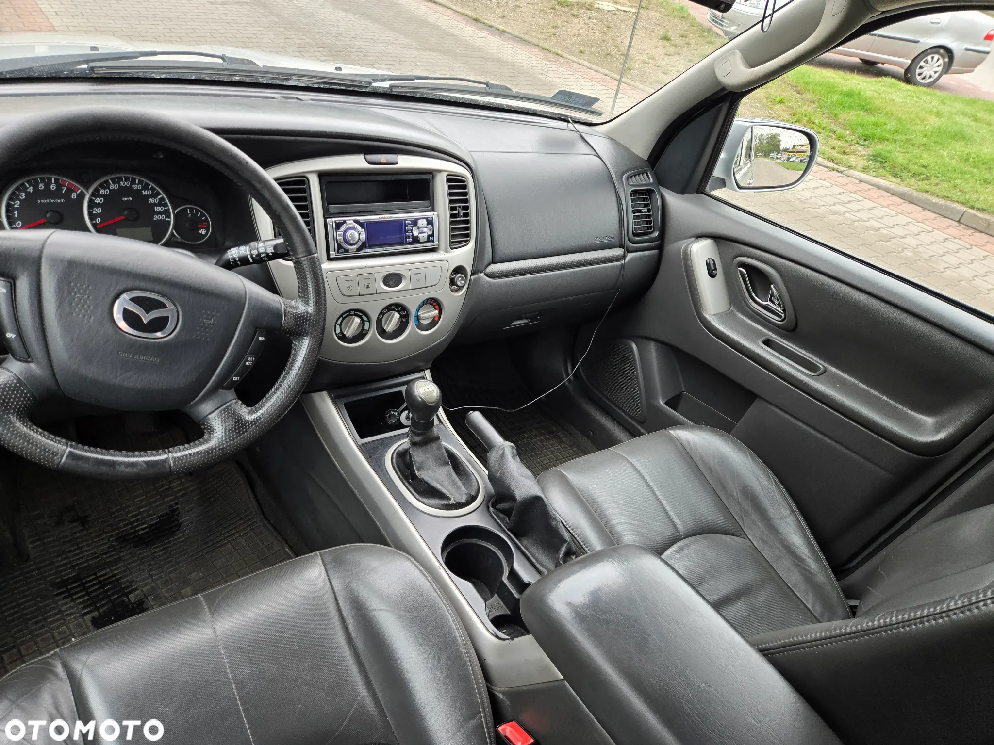 Mazda Tribute 4x4 Adventure Comfort - 7