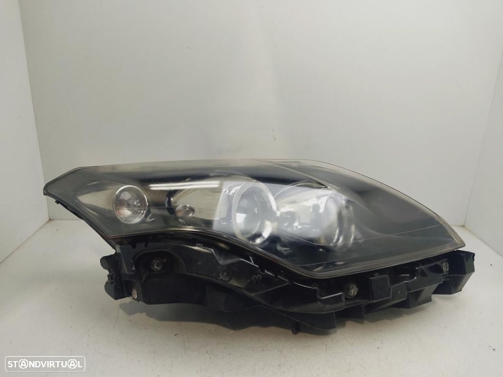 FAROL DIREITO RENAULT LAGUNA - 1