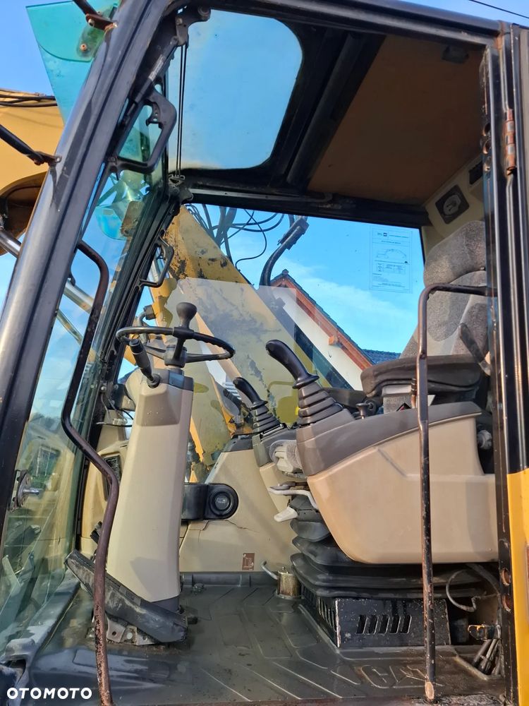 Caterpillar M313C - 16