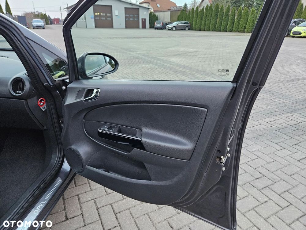 Opel Corsa 1.4 16V Cosmo - 29