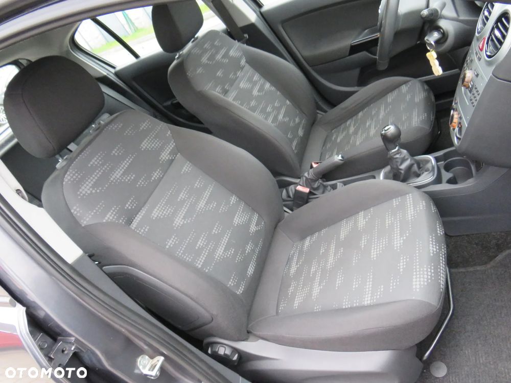 Opel Corsa 1.2 16V Cosmo - 35