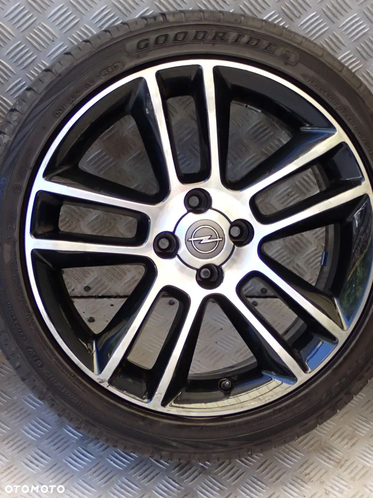 KOŁA FELGI ALUMINIOWE OPEL 7JX17 ET 44 4X100  OP087 (K1) Z OPONĄ LATO GOODRIDER  215/45/17 - 6