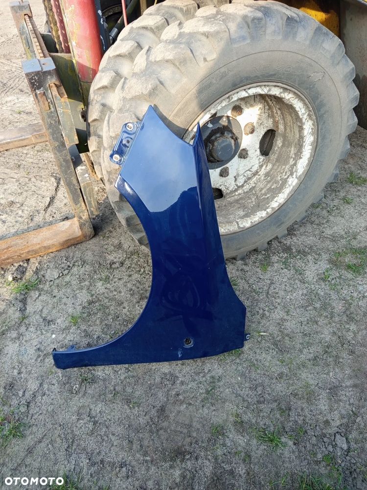 Błotnik lewy przedni  LF5A Fabia II Lift poznan - 1