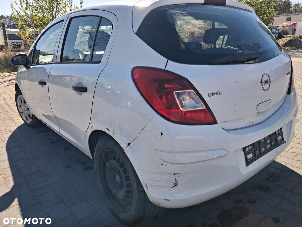 Opel Corsa D 3 silnik kompletny 1.3 CDTI diesel skrzynia biegów F17 W394 drzwi klapa zderzak błotnik kolor biały Y474 sprzęgło szyba deska wyświatlacz pas fotel podsufitka alternator maglownica pompa sterownik panel sterownik mcperson wahacz zwrotnica belka sanki przewód wąż wiązka poduszka lampa reflektor zamek zacisk radio stacyjka boczek obudowa osłona tłumik wydech kolektor wtrysk czujnik NA CZĘŚCI - 5