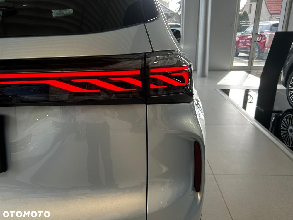 Chery Tiggo 4 1.5 T-GDI HEV Prestige DHT - 8