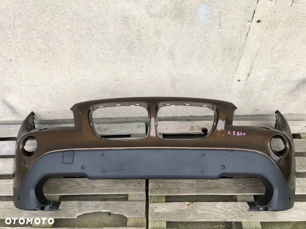 ZDERZAK PRZÓD PRZEDNI BMW X1 I E84 2009- CAŁY ORYGINAŁ
