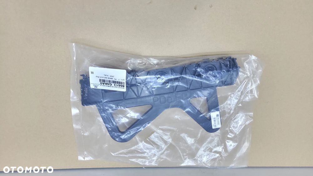 I30 III N 18- FASTBACK ŚLIZG ZDERZAKA LEWY TYLNY TYŁ UCHWYT 86613-G4AA0