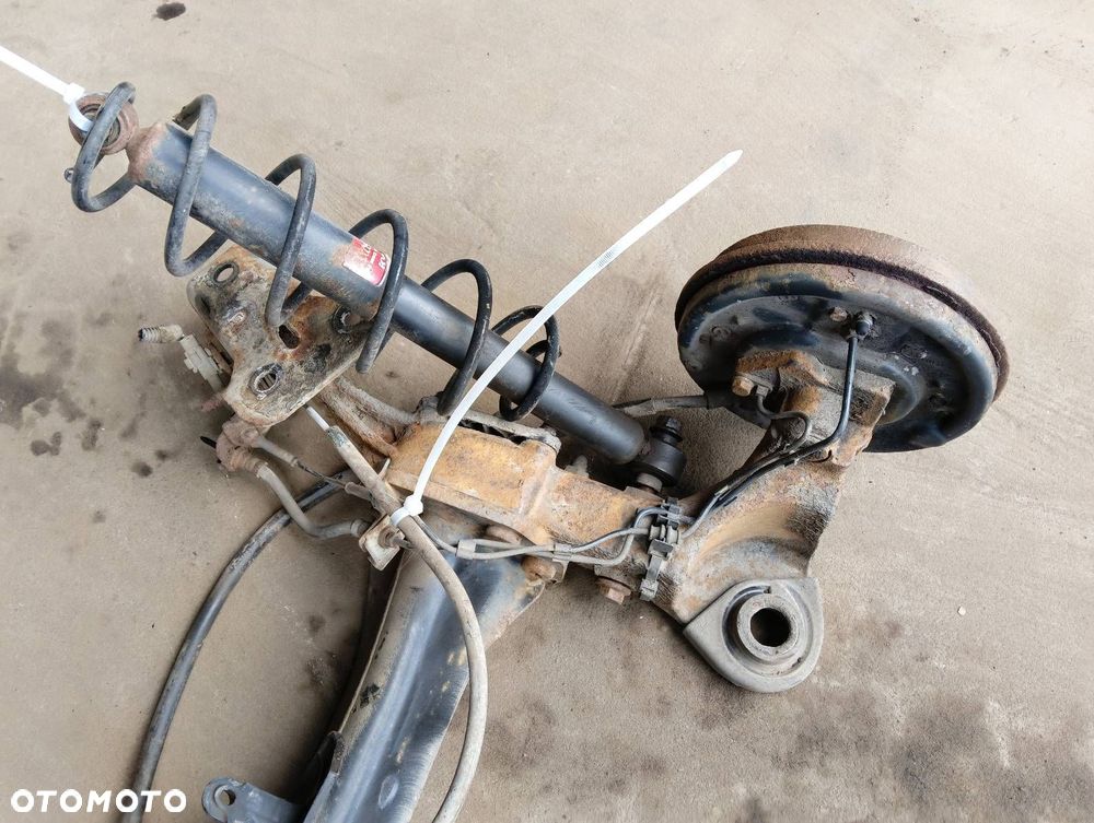 BELKA OŚ ZAWIESZENIA TYŁ BĘBNY Z ABS CITROEN C3 I - 2
