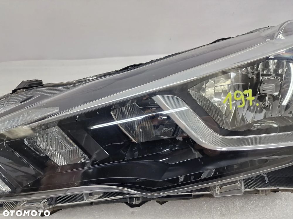 NISSAN MICRA K16 16- LEWA ZWYKŁA LAMPA PRZEDNIA PRZÓD LED , NR KOITO 100-18730 / 100-18728 , NR AUKCJI LA197 - 6