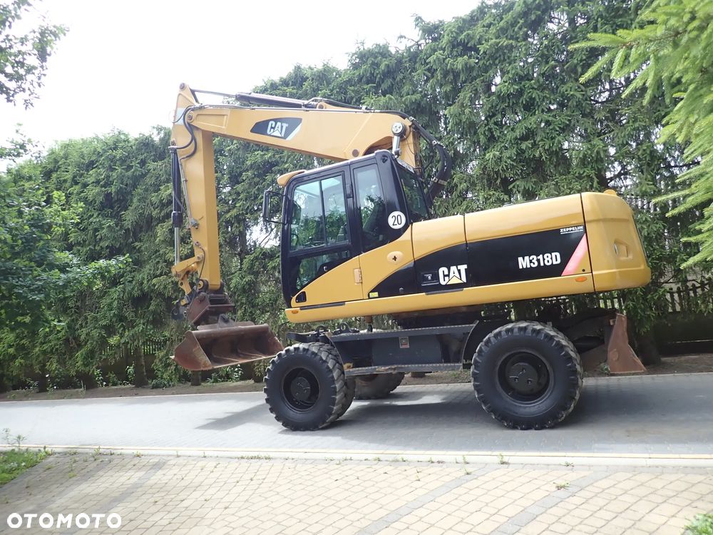Caterpillar M318D - 1