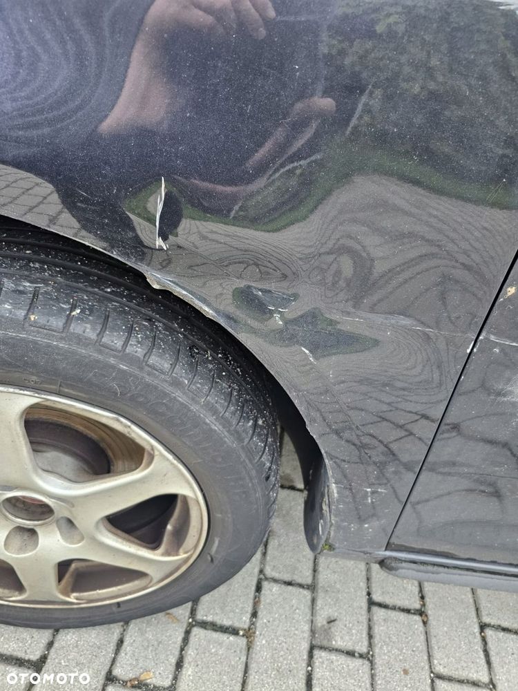 błotnik lewy przód vw touran kod lakieru lc9z - 2