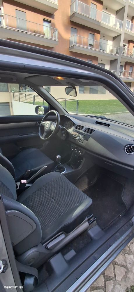 Suzuki Swift 1.3 DDiS GLX - 9