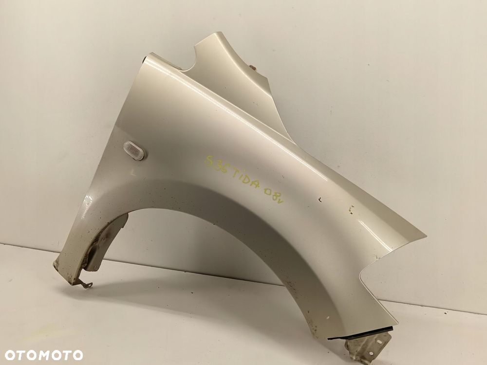 BŁOTNIK PRAWY PRZEDNI NISSAN TIIDA 04-12 - 2