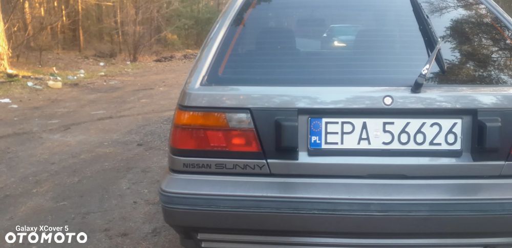 Nissan Sunny - 32