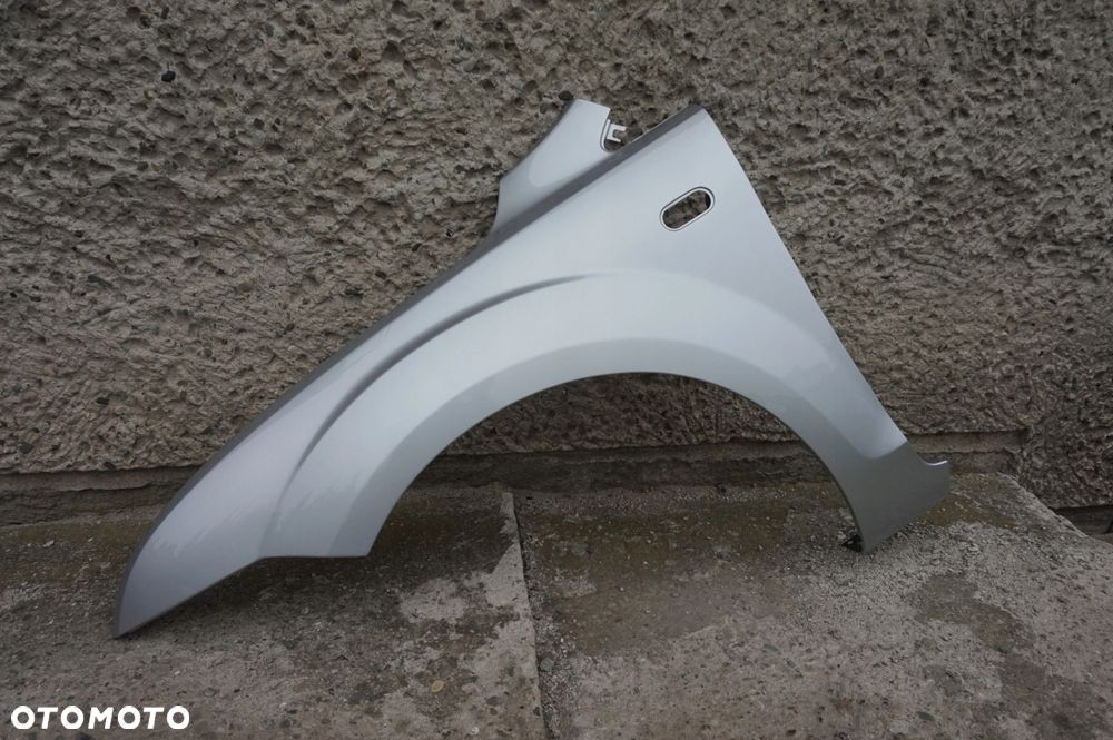 BŁOTNIK LEWY FORD FOCUS II MK2 04/08r 03 O3 - 4