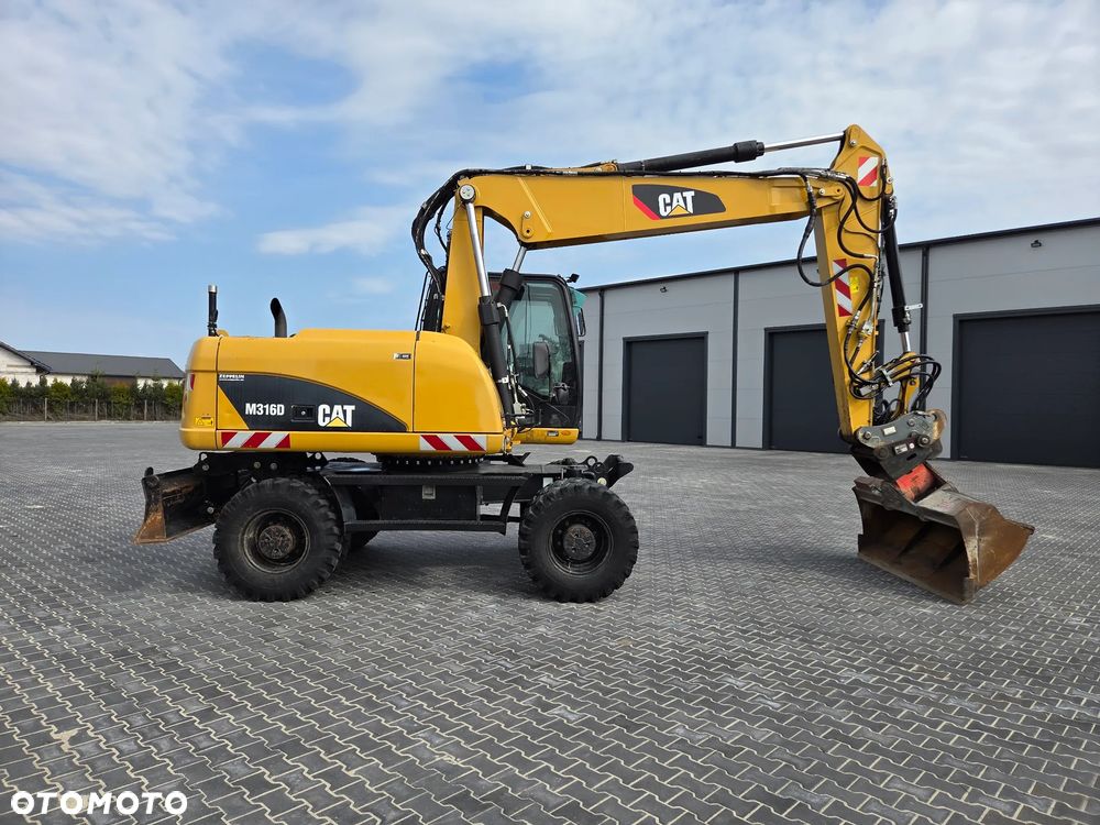 Caterpillar M 316 D / z Niemiec / Tylko 7500 mth / Instalacja pod System 3D Trimble / / - 5