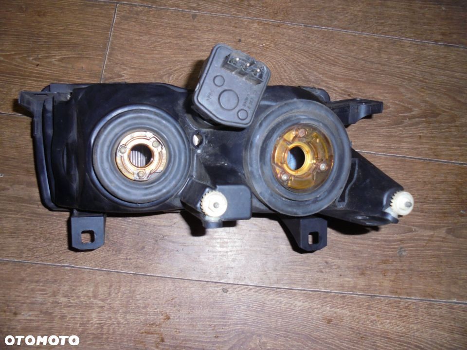 REFLEKTOR LEWY BMW E 36 HELLA - 2