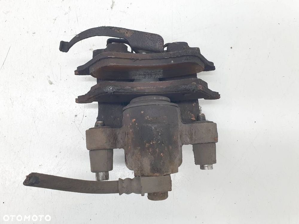 ZACISK HAMULEC PRZÓD PRAWY CARAVAN VOYAGER IV 3.3 V6 - 7